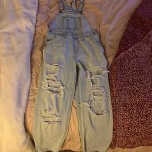 Light blue ripped Jean overalls